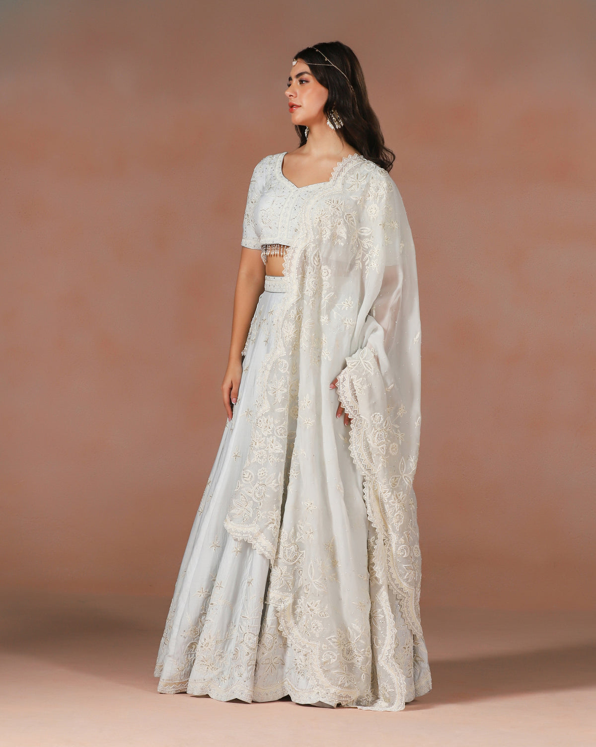 Elegant Powder Blue Aari Work Lehenga With Hand Sewn Pearl Detailing