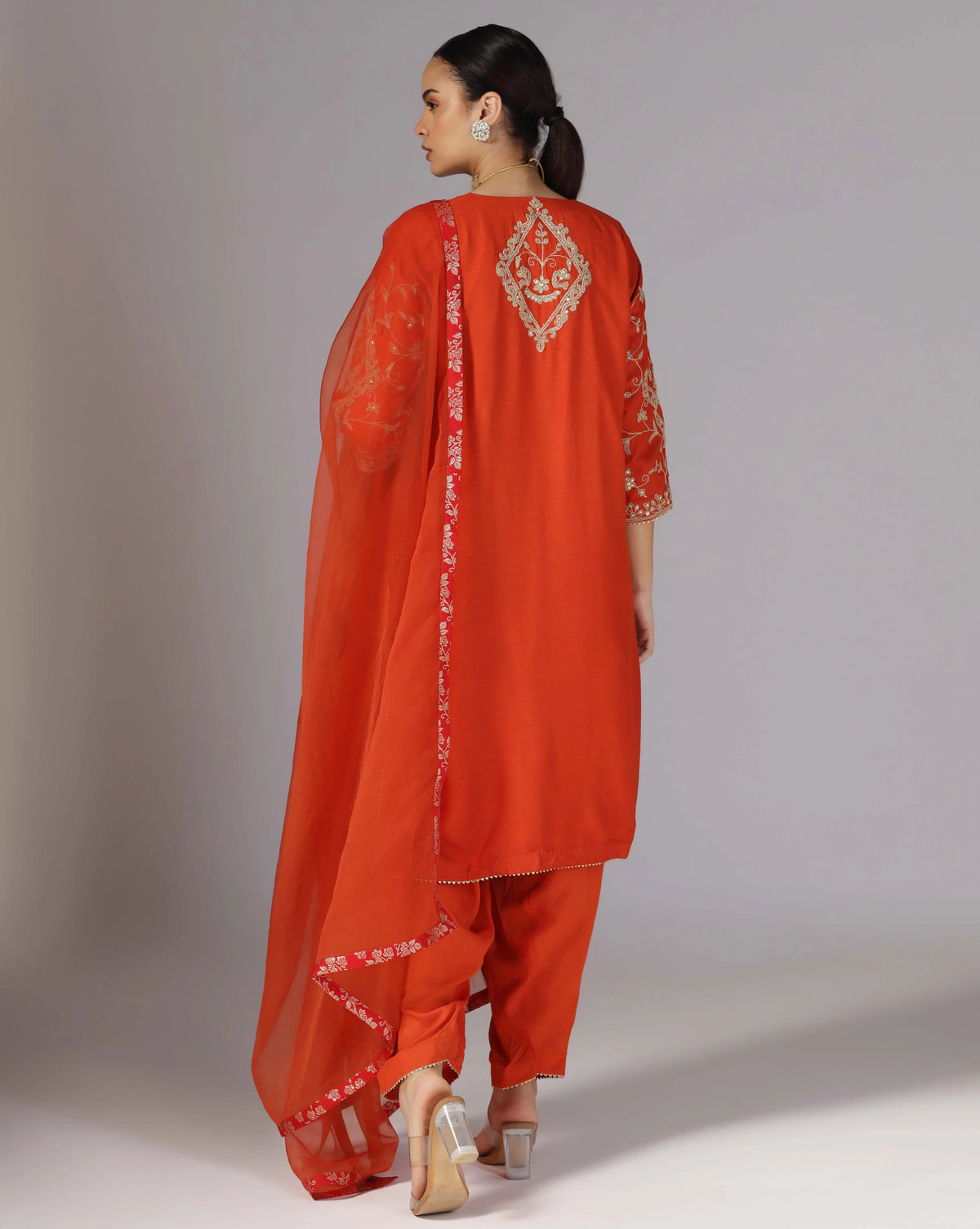 Vibrant Orange Kurta Salwar With Hand Crafted Dori Embroidery