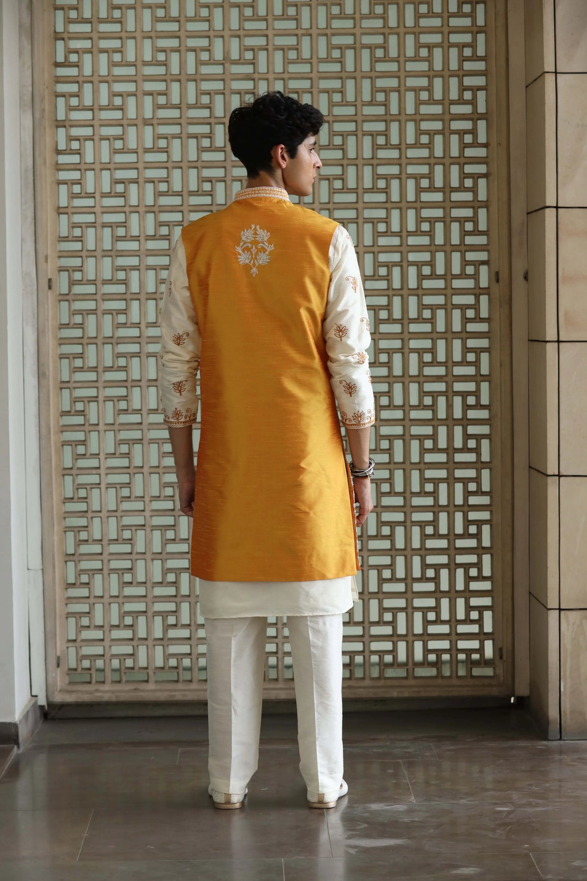 Elegant Cream Kurta Set With Vibrant Jacket