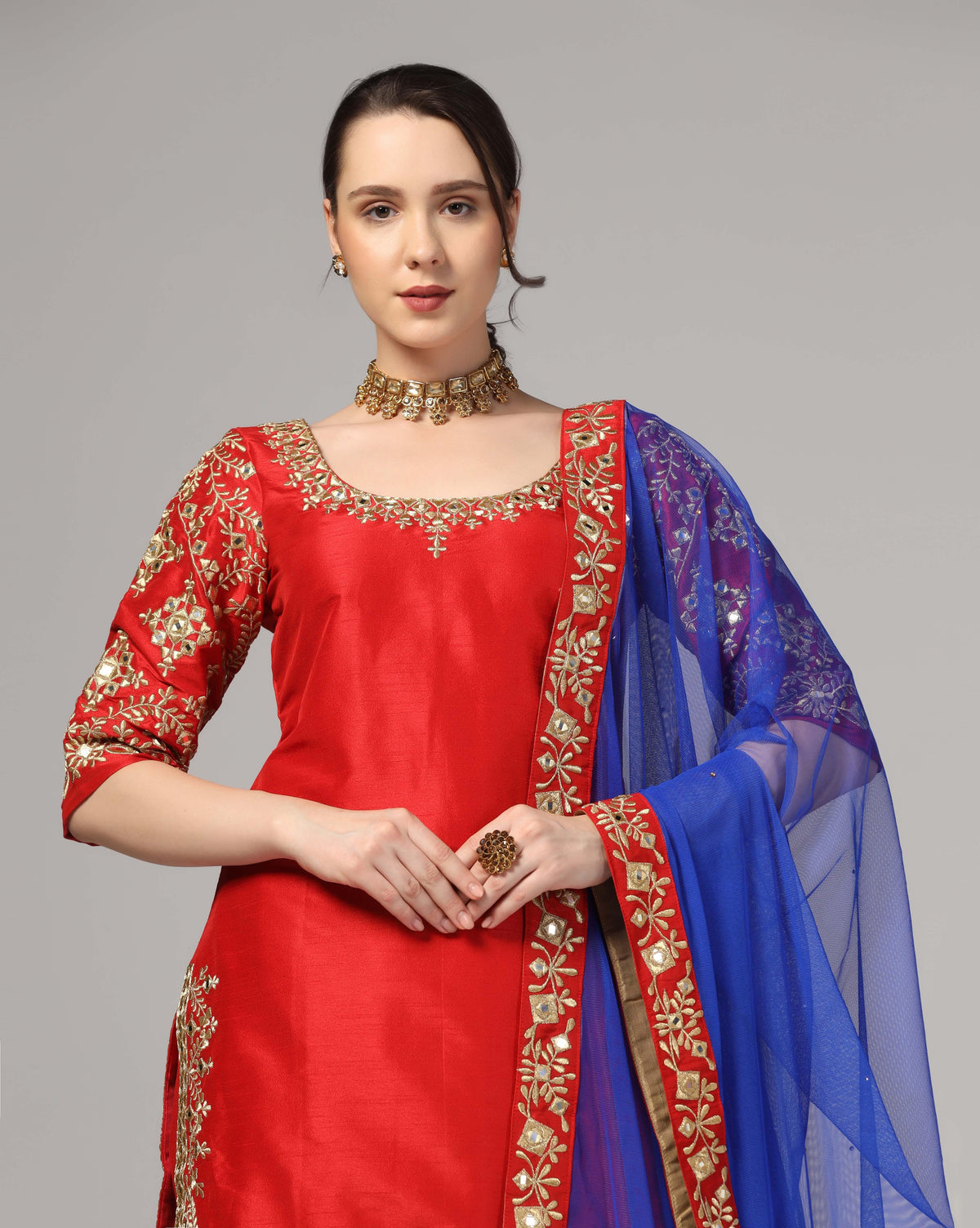 Red Dupion Silk Suit With Blue Dupatta Zari Thread & Mirror Work.