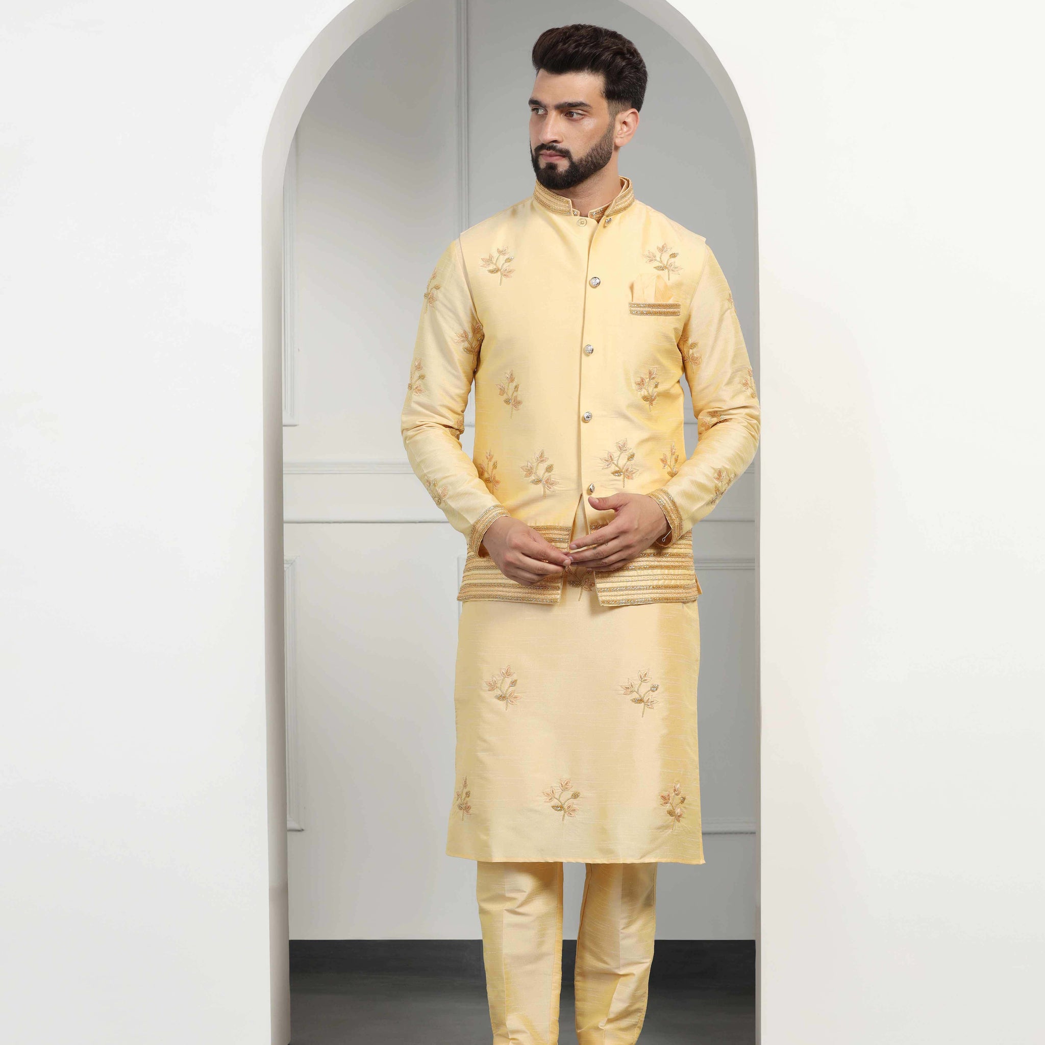 Monotone yellow mens kurta set with hand- embroidered bundi