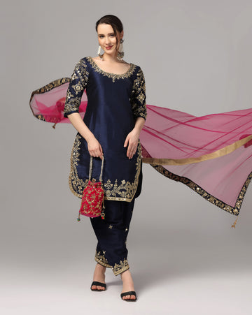 Blue Dupion Silk Suit With Blue Dupatta Zari Thread & Mirror Work.