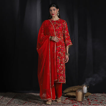 Red embroidered suit