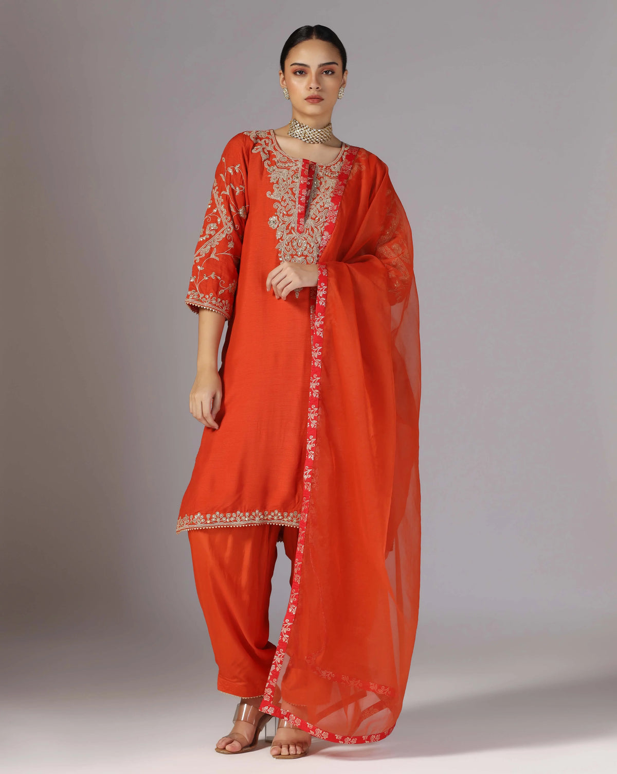 Vibrant Orange Kurta Salwar With Hand Crafted Dori Embroidery