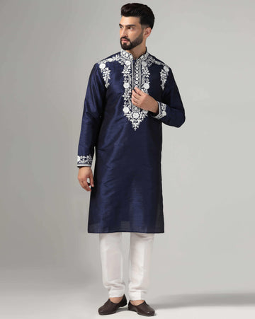 Elegant deep blue men's kurta set with intricate white resham work