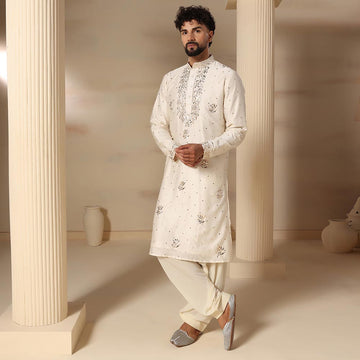 Traditional ivory men kurta set featuring intricate mukesh embroidery