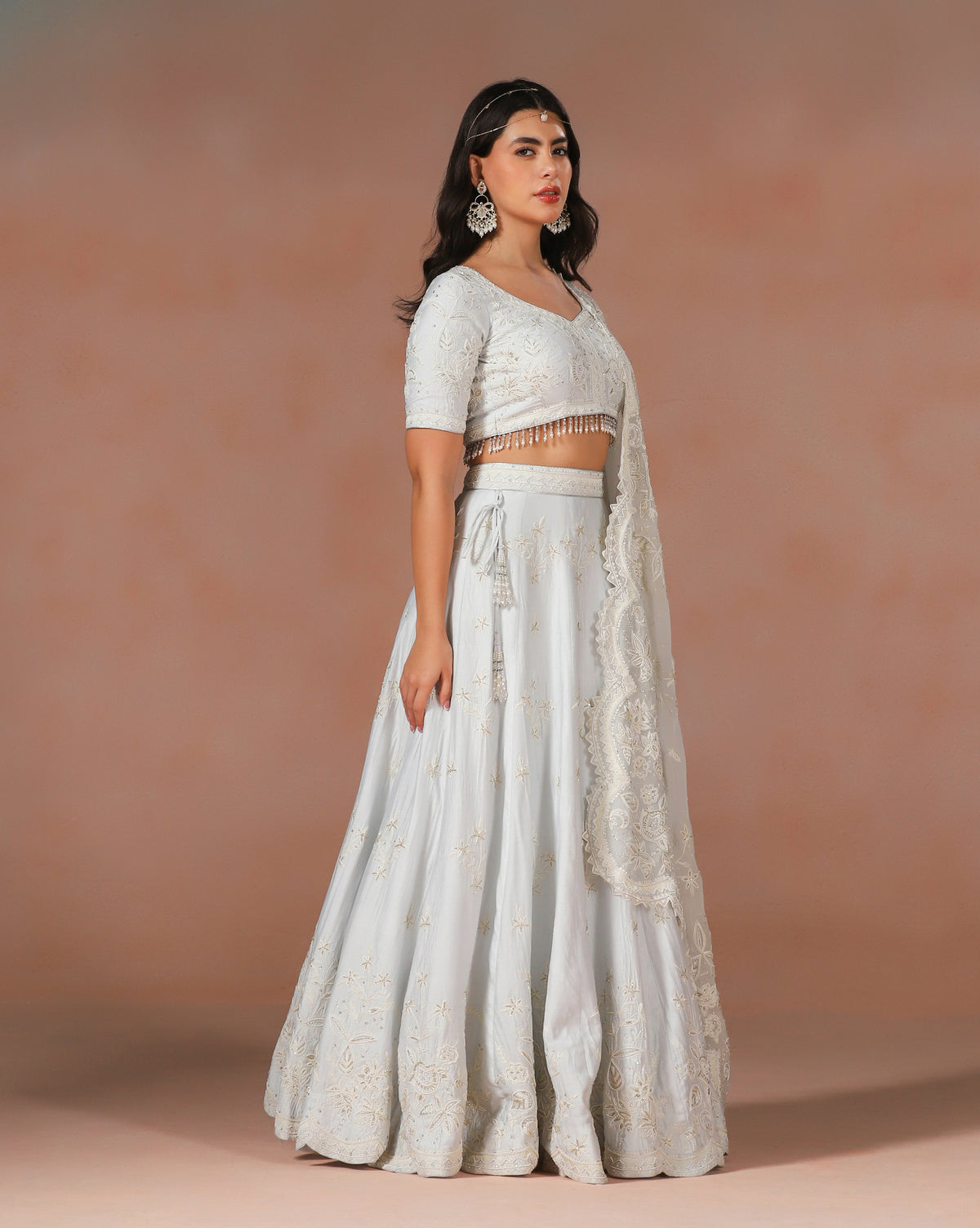 Elegant Powder Blue Aari Work Lehenga With Hand Sewn Pearl Detailing