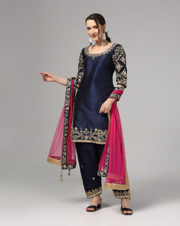 Blue Dupion Silk Suit With Blue Dupatta Zari Thread & Mirror Work.