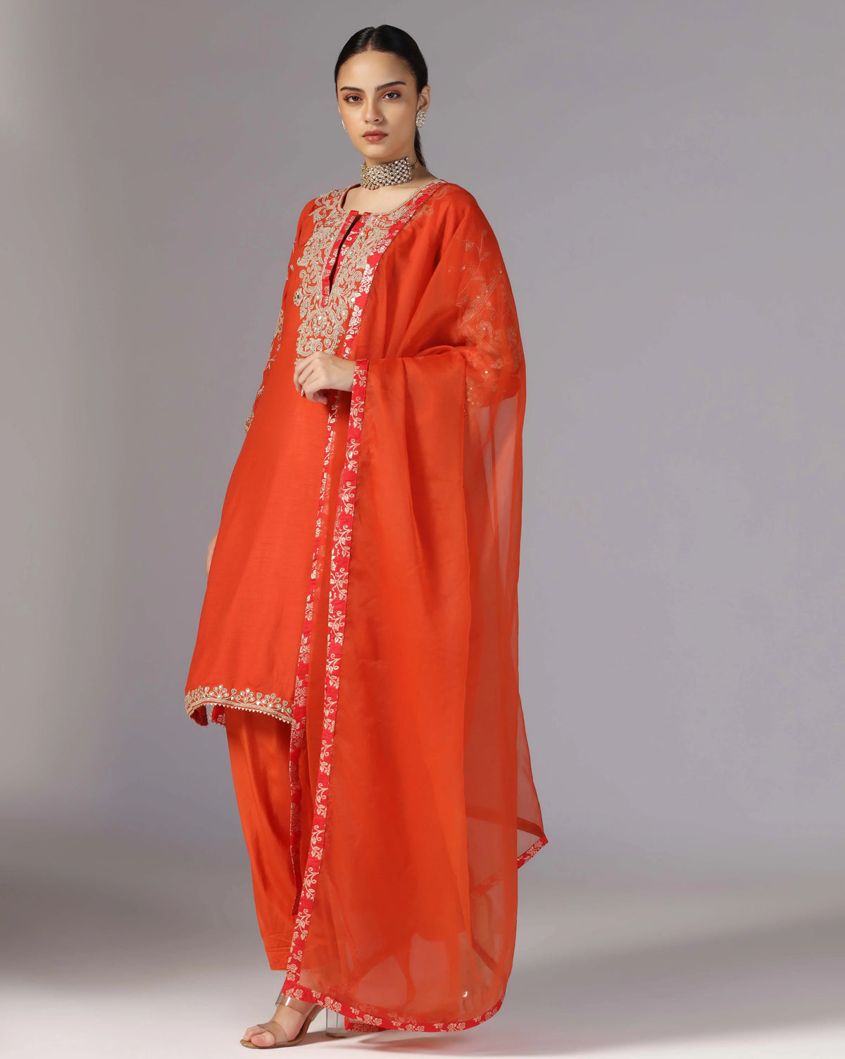 Vibrant Orange Kurta Salwar With Hand Crafted Dori Embroidery