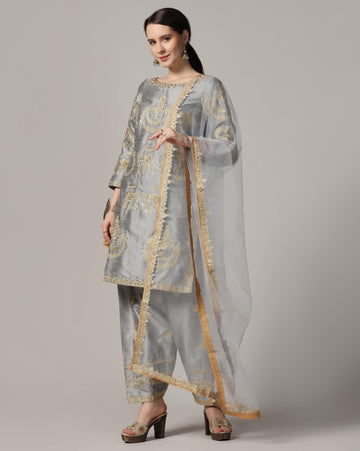 Silver golw, dupion silksuit with golden touch