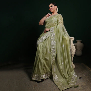 Green gotta crepe saree with unstitched blouse
