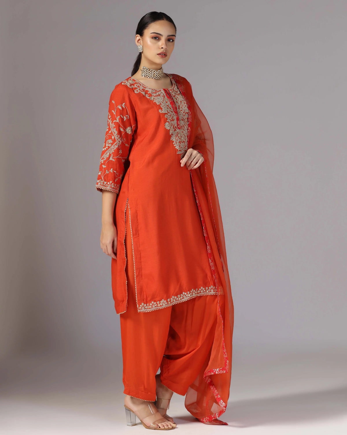 Vibrant Orange Kurta Salwar With Hand Crafted Dori Embroidery