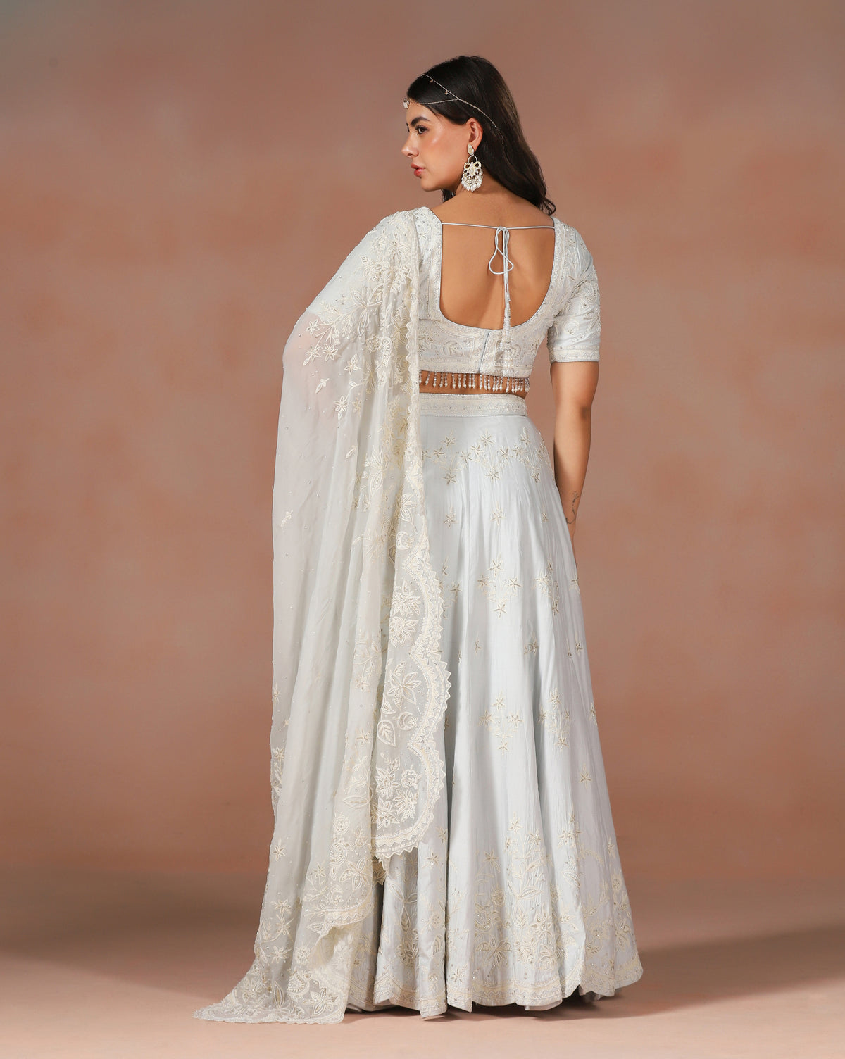 Elegant Powder Blue Aari Work Lehenga With Hand Sewn Pearl Detailing