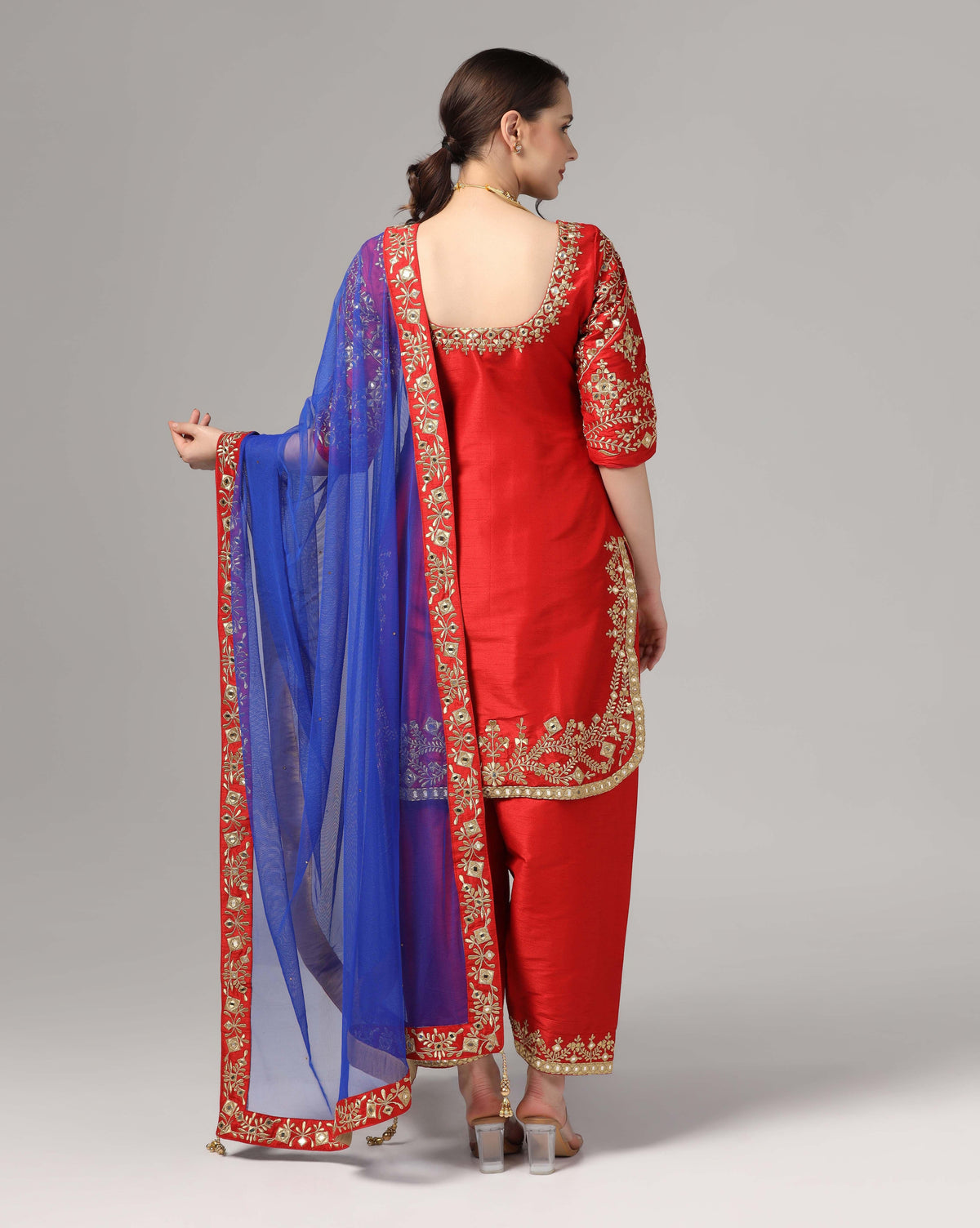 Red Dupion Silk Suit With Blue Dupatta Zari Thread & Mirror Work.