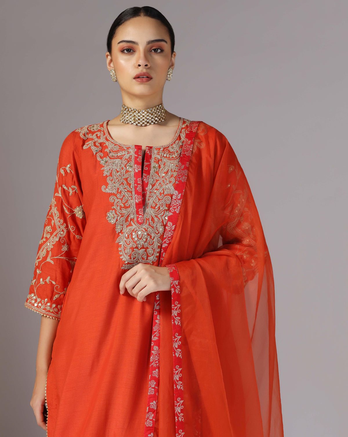 Vibrant Orange Kurta Salwar With Hand Crafted Dori Embroidery