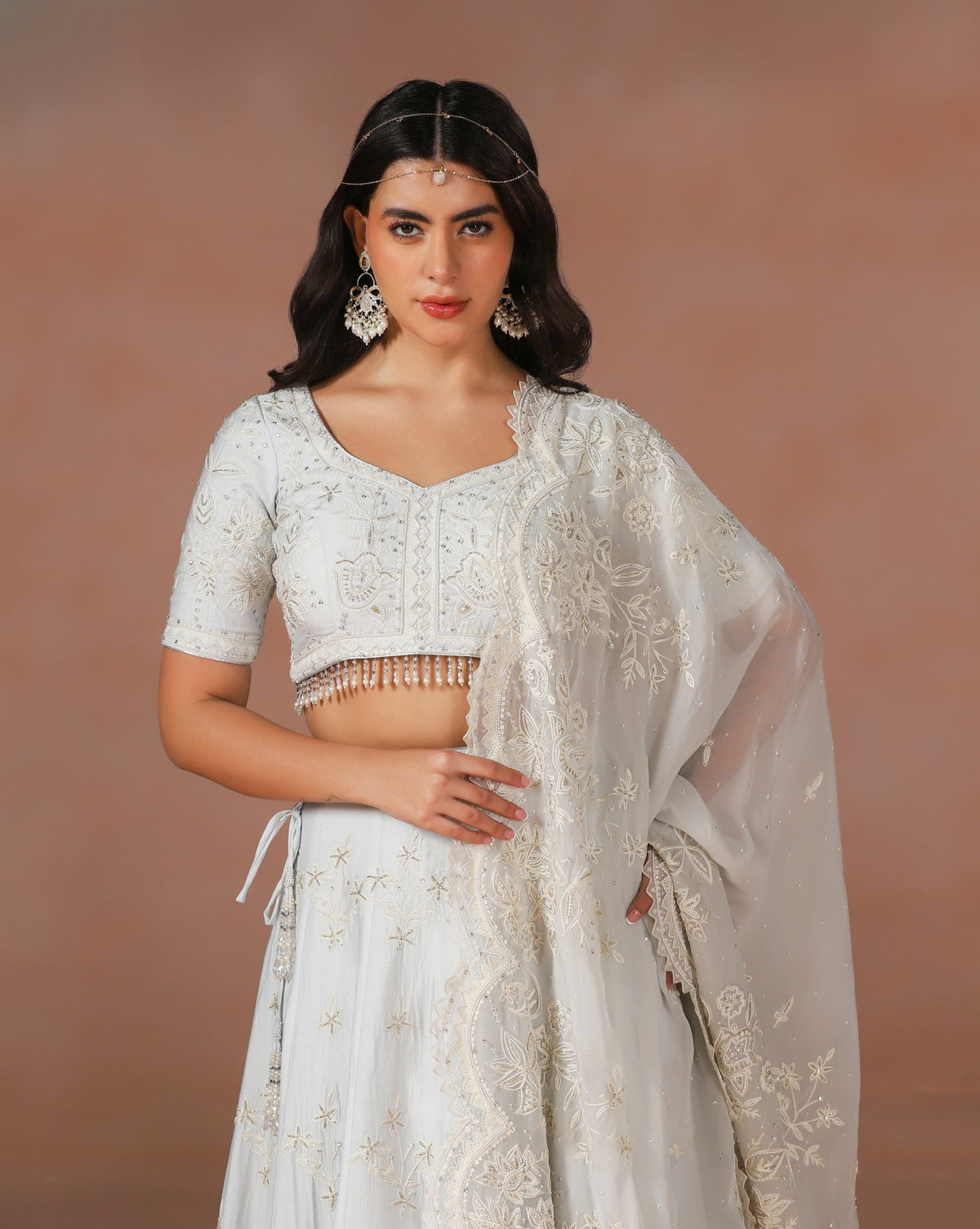 Elegant Powder Blue Aari Work Lehenga With Hand Sewn Pearl Detailing