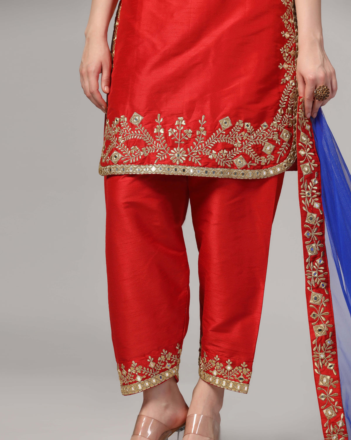 Red Dupion Silk Suit With Blue Dupatta Zari Thread & Mirror Work.