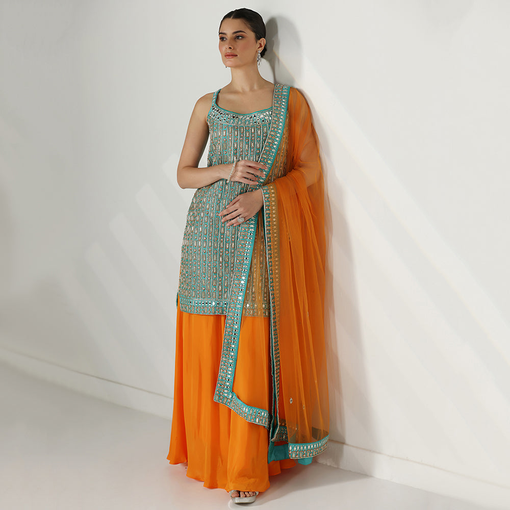 Turquoise Mirror-Work Sharara Set Featuring Contrasting Elements Like A Tangerine Flared Bottom And A Net Dupatta - image 2