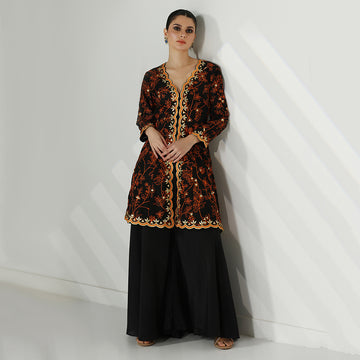 A Black Open-Front Flared Jacket Paired With A Flowing Black Sharara, Rust Orange Floral Embroidery Mirror Work - image 1