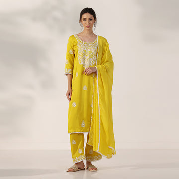 Mustard Yellow Suit With White Thread-Embroidered Yoke & Scattered Motifs, Paired With Matching Embroidered Pants & Lace-Trimmed Dupatta - image 2